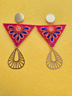 Brass Stud Embroidered Invented Triangle Earrings Stud Red Inverted triangle with a blue and orange embroidered petal overlay, surrounding a small circle shaped mirror, in the center of the inverted triangle. The stud portion of the earrings is a brushed brass circle shape. Connected to the point of the inverted triangle is a brushed brass cut-out teardrop shape. The post is plated in 18k gold and lined with polyester felt for comfort. Earrings are 4.5 inches long and 2.5 inches wide