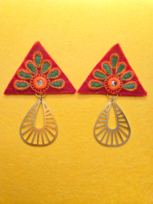 Embroidered Triangle Brass Chandelier Earrings Stud red triangle with a green and orange embroidered petal overlay, surrounding a small circle shaped mirror, in the center of the triangle. Connected at the bottom of the triangle, is a  brushed brass cut-out teardrop shape. The post is plated in 18k gold and lined with polyester felt for comfort. Earrings are 3.5 inches long and 2.5 inches wide.