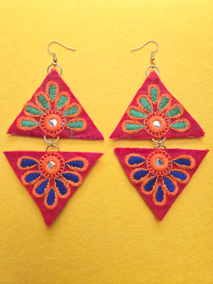 Blue & Green Petal Triangle Earrings Top and bottom mix and match green and blue embroidered fabric triangle shaped earrings arranged in a diamond shape. Earrings have a red background with embroidered green petals on the top triangle shape, and blue embroidered petals on the bottom triangle shape with hints of orange, along with a small mirrored center.  Earrings are 5 inches long and 2.5 inches wide with 18k gold plated ear wires.