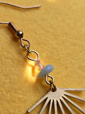 This is a close up of the glass crystal and amazonite semiprecious stone of the Amazonite & Brass Sunrays Earrings 