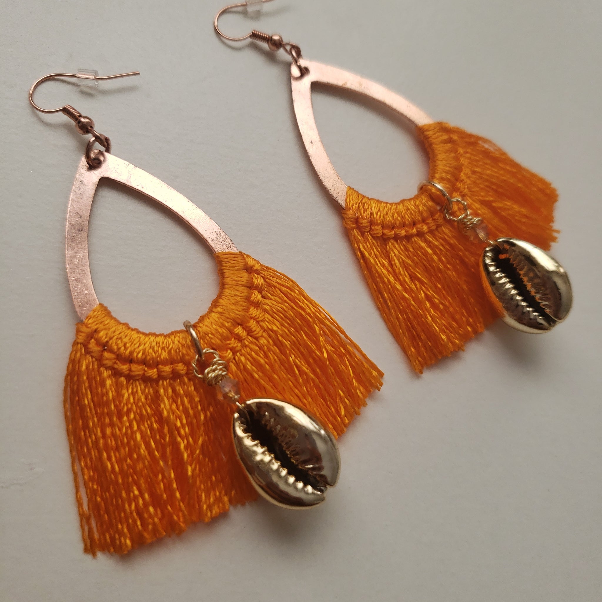 Golden Cowrie Shell Orange Tassel Earrings